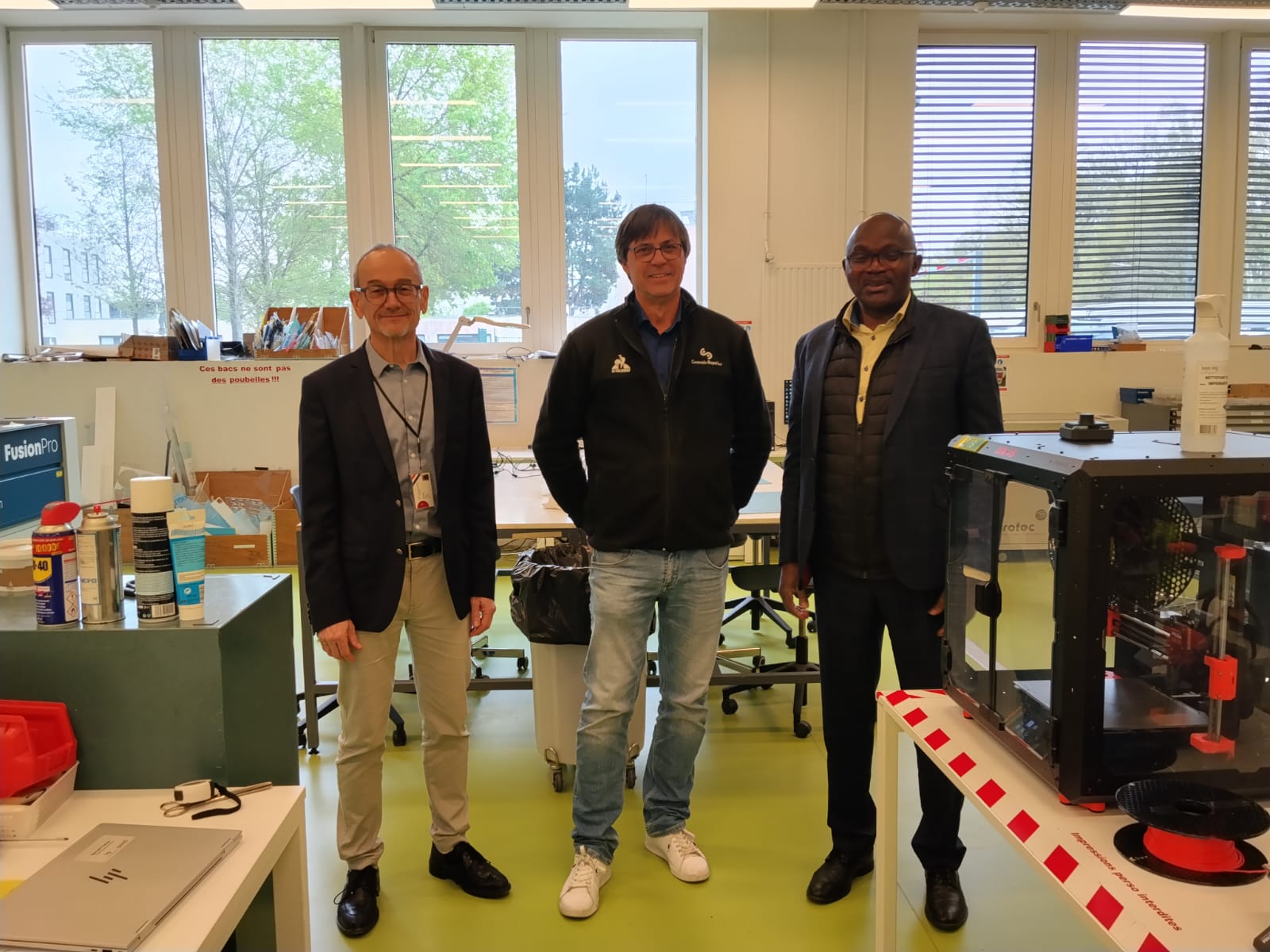 Three staff in a lab in CentraleSupelec, France
