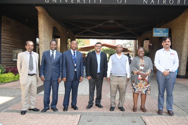 Dr. Bansal(center) poses for a photo with members of the college faculty.