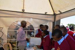 Stephen from Dept of Civil Eng talking to students during the fair. 